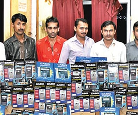 Mangled remains of a car that collided with a lorry near Ayyalur, Dindigul on Friday | Express