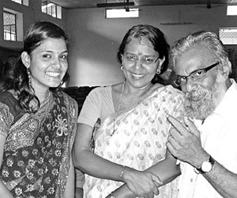 P Balachandran amidst his students and colleagues at the School of Letters, MG University, in Kottayam on Tuesday. His wife Sreelatha Balachandran is