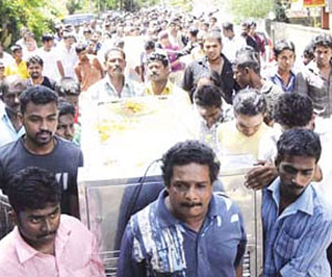 The bodies of Jithin and Bineesh, who drowned in the Periyar the other day, being taken to Fort Kochi Public Cemetery on Saturday | Express