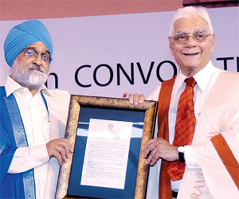 Governor Murlidhar Chandrakant Bhandare conferring the degree of doctor of Literature (Honoris Causa) on Deputy Chairman of Planning Commission Montek