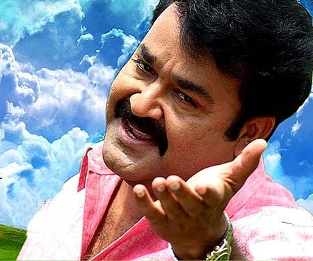 The poster of 'Snehaveedu'.