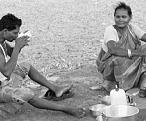 A man savours a bowl-full to raise his spirits I ENS