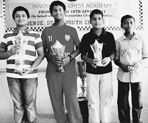 The state chess championships winners (l to r) Girish Koushik, Naren, Shabdik, Augustin with their trophies