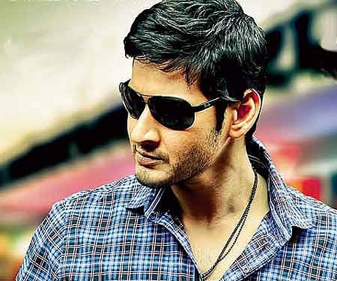 The poster of Mahesh Babu's new film 'Dookudu'.