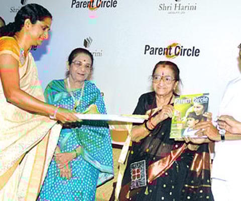 Nalina Ramalakshmi (left), editor, Parent Circle magazine, presents a copy of the fi rst issue to Dr YG Parthasarathy| Express Photo by P Jawahar.