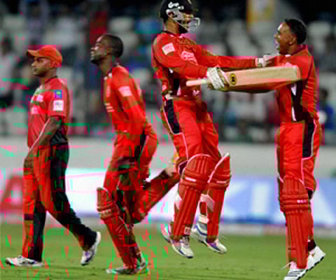 Cricketers of Trinidad and Tobago celebrate their victory over Ruhuna Squad (PTI)