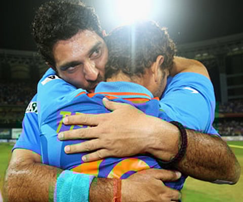 Yuvraj Singh and Sachin Tendulkar of India celebrate their teams win during the 2011 ICC World Cup Final between India and Sri Lanka. (Getty Images)