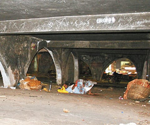A scene at the Koyambedu flower market. EPS