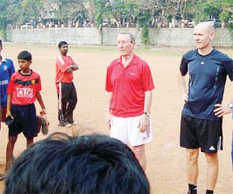 UEFA professional coach Harald Braner and his son and coach Frank Braner with AIFF director, coaching, Gabriel E Joseph at the youth soccer developmen