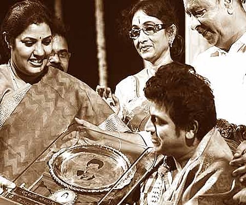 D Purandeshwari presenting NTR National Award to actor Shivarajkumar; actress Bharathi Vishnuvardhan looks on| Nagesh Polali.