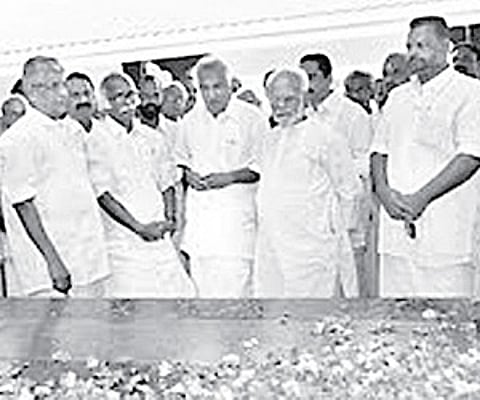 Devaswom Minister Kadannappally Ramachandran and Opposition Leader Oommen Chandy at the Mannam Samadhi at Perunna on Saturday| Express Photo.