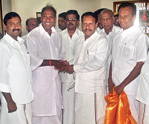 AIADMK MPs from Tamil Nadu, M Thambidurai (fourth from L) and S Semmalai, calling on former chief minister N Rangasamy (third from L).
