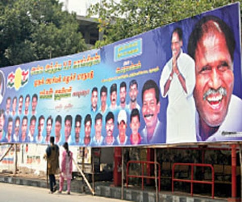 Giant banners put up by various political parties on MG Road near Muthialpet in Puducherry | G Pattabira
