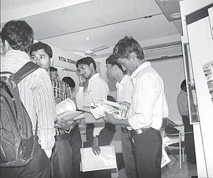 Candidates waiting at the job fair at the Federation of Andhra Pradesh Chambers of Commerce and Industry (FAPCCI) in Hyderabad on Wednesday | Express