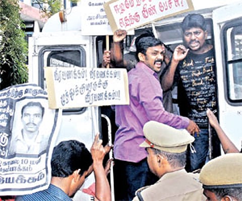 Activists who observed the death anniversary of Muthukumar being taken into custody by police at Shastri Bhavan, in the city on Friday/P Jawahar.