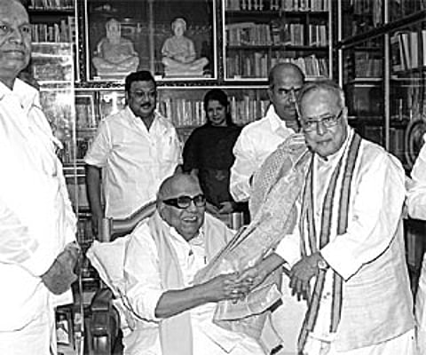 GREETINGS: Union Finance Minister Pranab Mukherjee with Chief Minister M Karunanidhi at his residence in Chennai on Saturday. Also seen are DMK Parlia