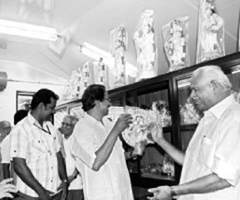 Minister for Khadi and Village Industries C N Balakrishnan (right) at the Khadi emporium on Gandhi Bhavan campus on Wednesday