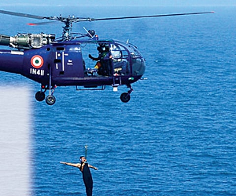 The crew of a helicopter from INS Rana display their rescue skills as part of the naval exercise off the city’s coast on Sunday. (File)