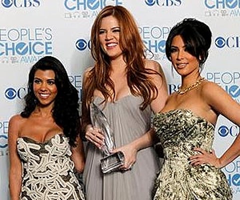 Kourtney Kardashian, Khloe Kardashian, and Kim Kardashian. (Photo: AP)