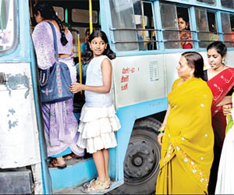Women board a bus at Shivajinagar bus stop | NAGARAJA GADEKAL