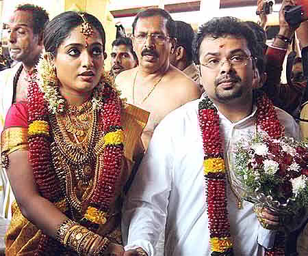 Kavya Madhavan with Nishalchandra after their marriage- Express photo.