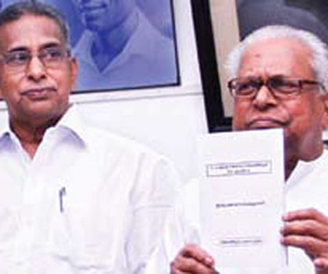 V S Achuthanandan releasing the LDF election manifesto in Thiruvananthapuram on Tuesday. Also seen is LDF convener Vaikom Viswan | Express Photo.