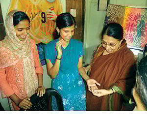 Kanchana Mala at B P Moideen Seva Mandir spending time with the many young and destitute women whom she has helped over the past decades