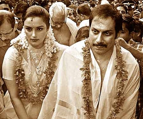Shwetha with her husband Sreevalsan Menon, a former journalist, after their wedding at Valanchery on Saturday | Express.