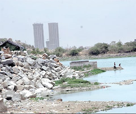 The Thammidikunta lake near the Hi-tec City in Hyderabad which is drying up due to illegal encroachments | Sai Ramesh.