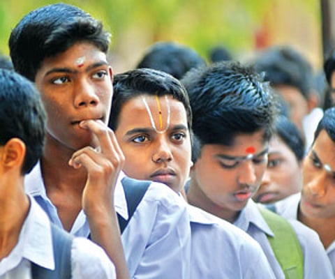 HOLDING THEIR BREATH:Tense SBOA school students shortly before taking their Class X CBSE Board exam, in the city, on Wednesday.
