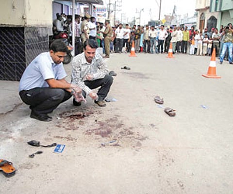 A BLOODY MORNING: Detectives gather clues from the scene of the attack on Akbar Owaisi| Express Photo.