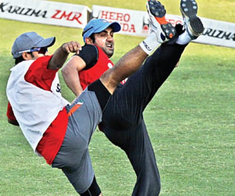 Actor Karthi with children living with the disorder, in the city, on Saturday. (EPS Photo)