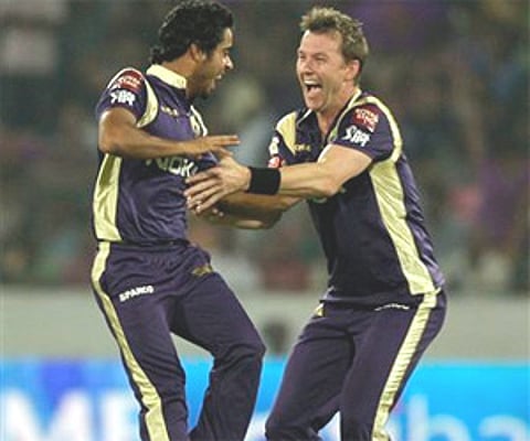 KKR players Iqbal Abdullah and Brett Lee celebrate the wicket of DC skipper Kumar Sangakkara during their IPL match in Hyderabad on Tuesday. AP