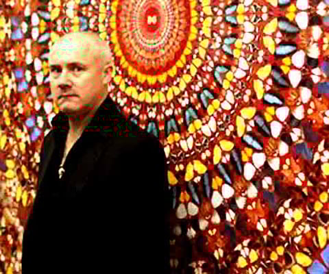British artist Damien Hirst stands beside the 2006 piece "I Am Become Death, Shatterer of Worlds (AP Photo/Matt Dunham).