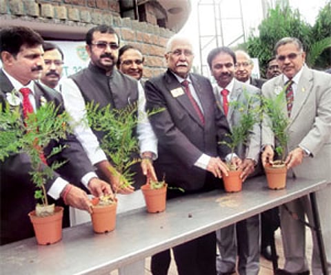 MLA N A Harris (third from left), Shantinagar Constituency, along with Lions Club members at the launch of the tree planting drive