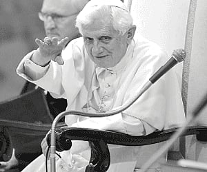 Pope Benedict XVI waves to the congregation gathered in Aula Paolo VI at the Vatican for his weekly general audience on Wednesday. The Pope begins a h