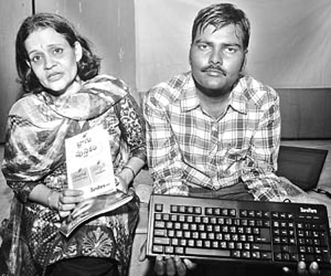 Manasulomata Sujatha and Rahman at the launch of a Telugu computer keyboard in Vijayawada on Sunday
