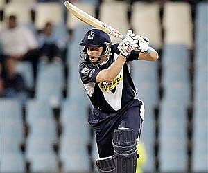 Victoria Bushrangers captain David Hussey watches his shot during the Champions League Twenty20 cricket match against Wayamba Elevens. AP Photo