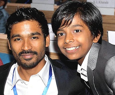 K Dhanush, the recipient of Best Actor award with Best Child Artiste Harsh Mayar. PTI Photo.