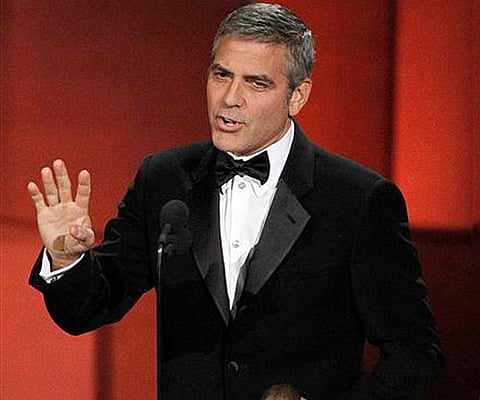George Clooney accepts the Bob Hope Humanitarian Award(AP Photo/Chris Carlson)