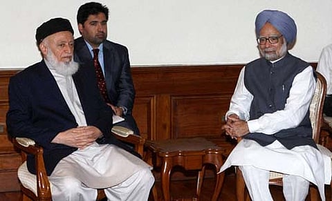 Kashmiri Muslims offers prayer on a street on the first day of the Muslim holy month of Ramzan in Srinagar. (AP)