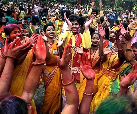 Students perform a traditional dance as they celebrate 'Basanta Utsav' or spring festival in Kolkata. (AP)