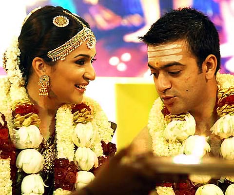 Soundarya and Ashwin during the wedding ceremony in Chennai. EPS