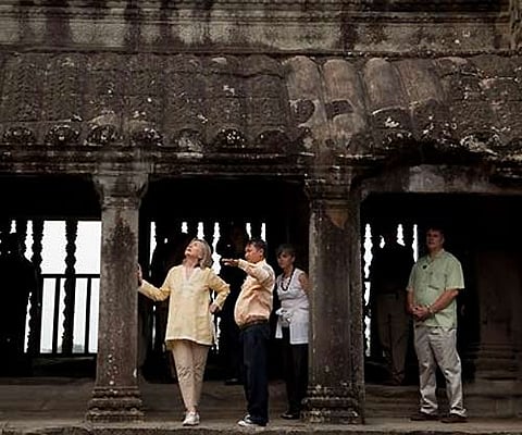 US Secretary of State Hillary Rodham Clinton takes a tour of Angkor Wat temple complex on Sunday in Angkor, Cambodia. AP Photo