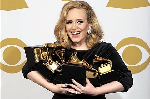 Adele honoured by Queen Elizabeth II