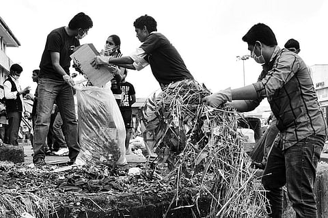 Students clean K R Market