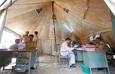 Where the Police Share 'Office' With Creepy Crawlies