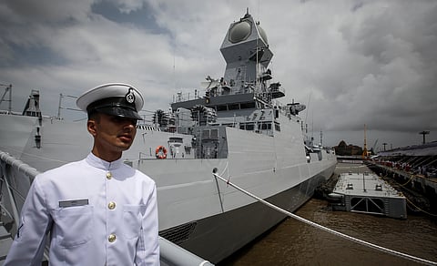In this file photo, an Indian navy serviceman walks down the gangplank of newly commissioned warship, INS Kolkata, during its commissioning ceremony at a naval base in Mumbai August 16, 2014. |Reuters
