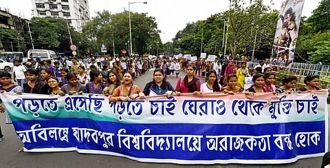 Supporters of Trinamool Congress' students' wing walk in a rally supporting Jadavpur University VC Abhijit Chakraborty in Kolkata on Monday | PTI
