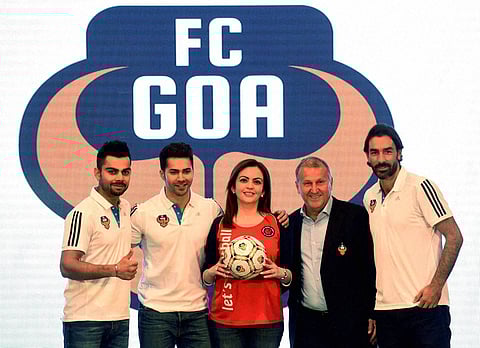 FC Goa s coach Zico and marquee player Robert Pires along with Nita Ambani founding chairperson Football Sports Development co-owner cricketer and co-owner of the club Virat Kohli and actor Varun Dhawan during a press conference in Mumbai on Tuesday | PTI
